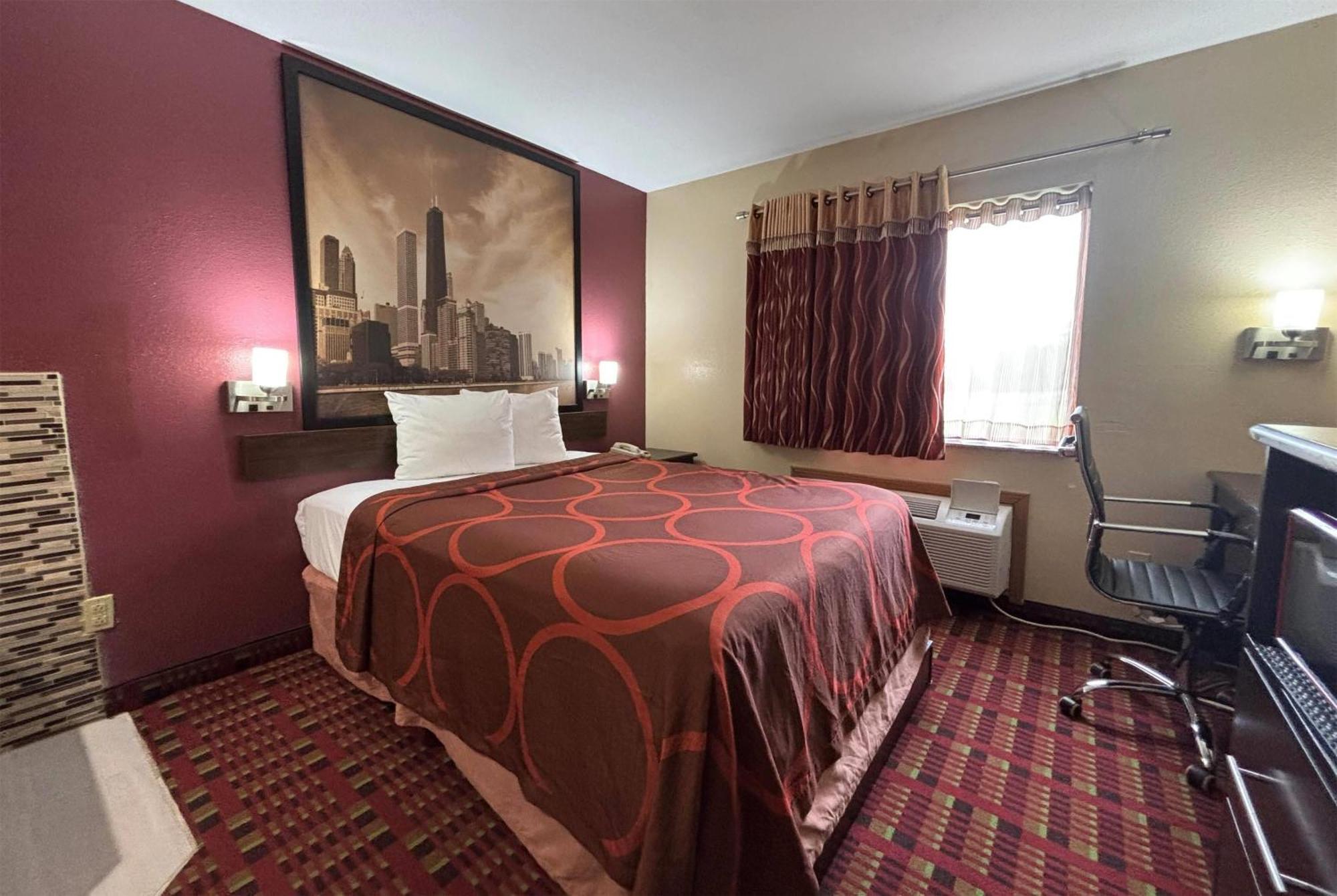 Super 8 by Wyndham Paris IL Motel Bagian luar foto